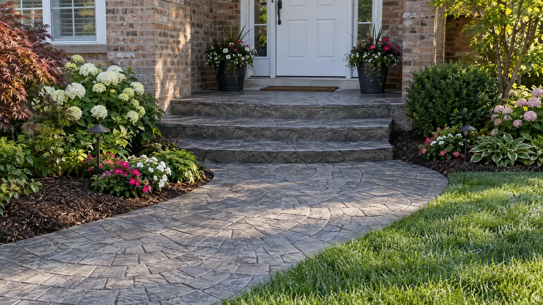 Stamped concrete walkway and front steps